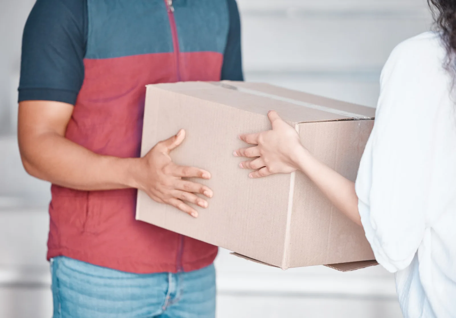 Delivery box, courier service and people hands for commerce, distribution and supply chain industry
